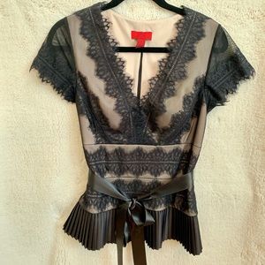 Dress, Black top and skirt are separate pieces.